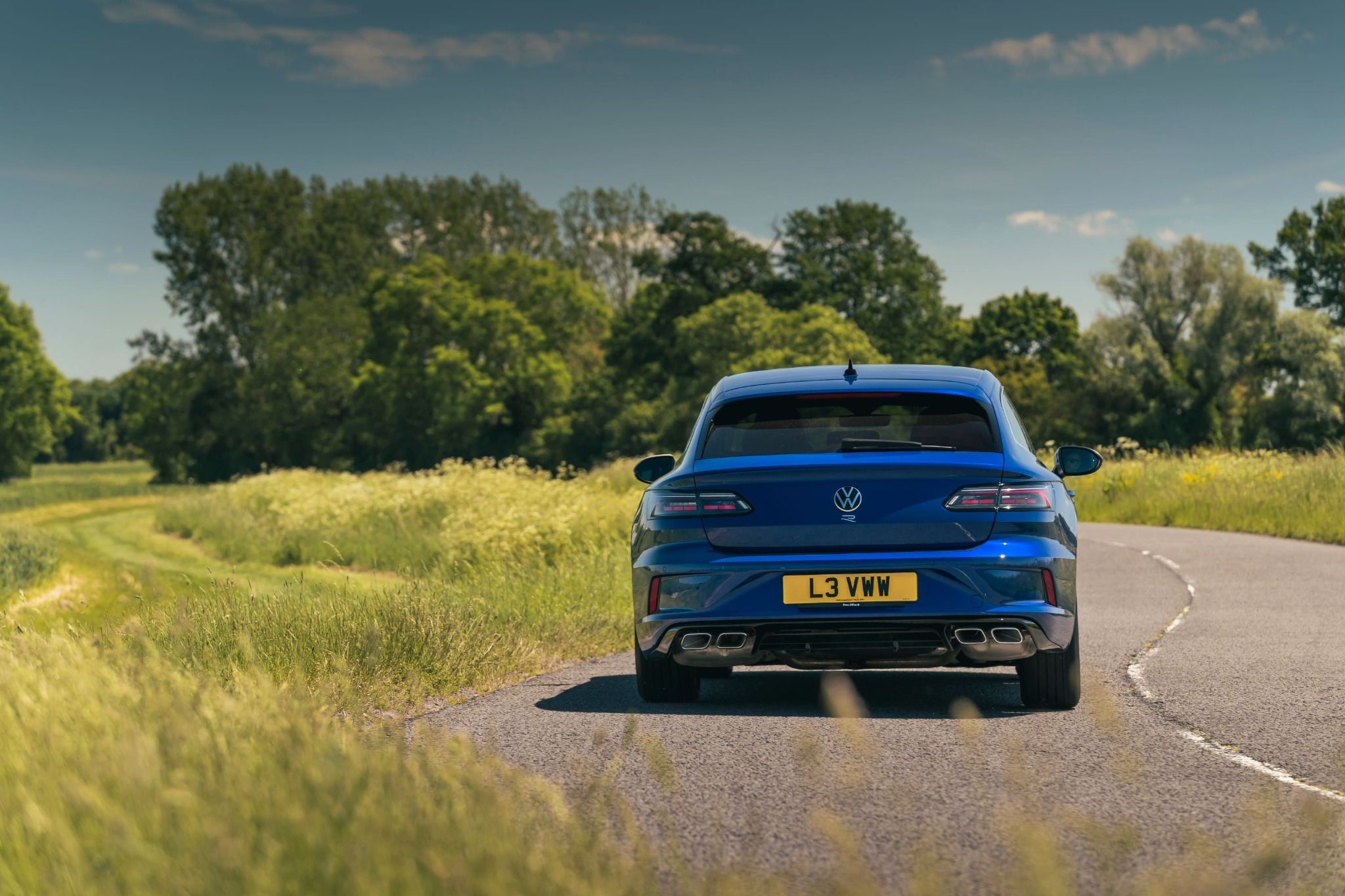 VW Arteon Driving in the Country Side Rear Shot