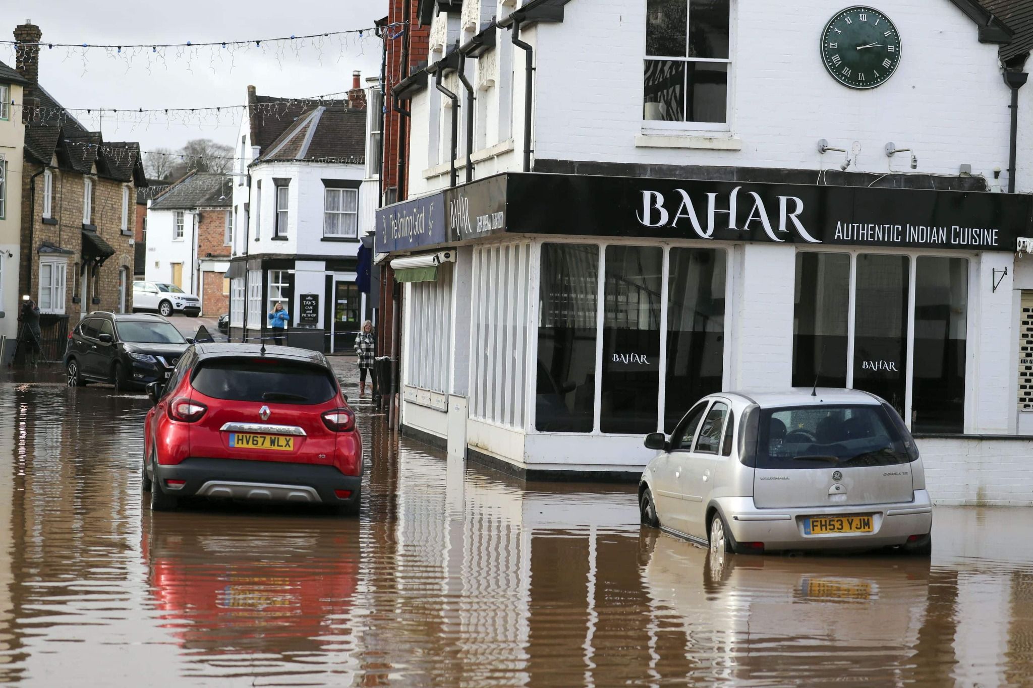 Flooding around cars and shops